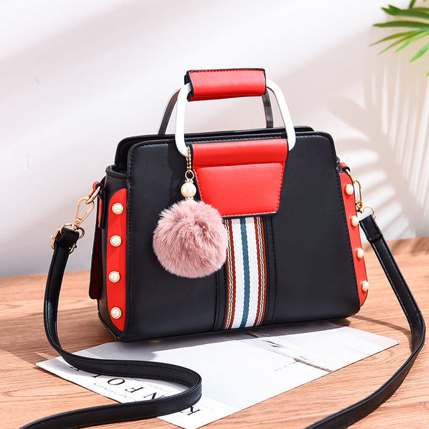 Bolso de mano con detalles modernos – Fiorella