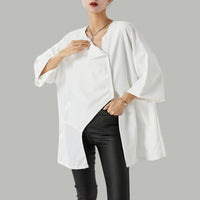 Barbara - Elegante blusa asimétrica