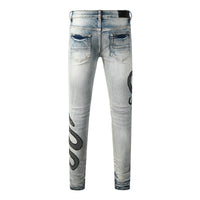 Pantalones vaqueros slim con estampado serpiente - Eldric