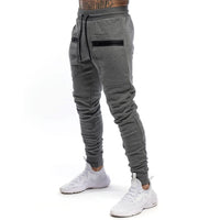 Pantalones deportivos para hombre tejido técnico estilo ajustado - Finn